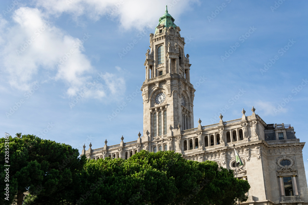 Porto City Hall. Pine trees. Blue sky with clouds. Porto City Hall. Pine trees. Blue sky with clouds.