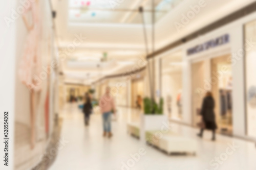 Walkways in a large shopping center. Blur