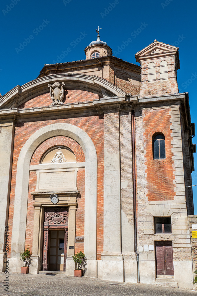Obraz premium HIstorical center of Corinaldo with stone houses, chucrh, steps and flowers