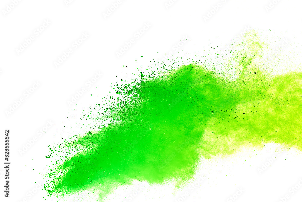 Green and yellow powder explosion on white background.