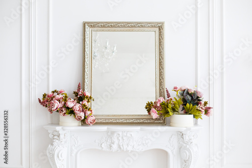 Tableau sur toile mirror in a classic luxury room in light colors