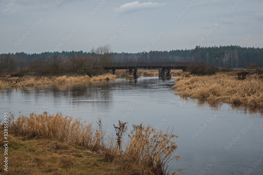 Wooden bridge over the Pilica river near Przedborz, Lodzkie, Poland Wooden bridge over the Pilica river near Przedborz, Lodzkie, Poland
