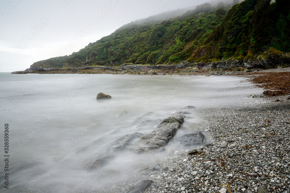 English Channel rolls into Portlander Bay,  near West Looe, Cornwall,UK