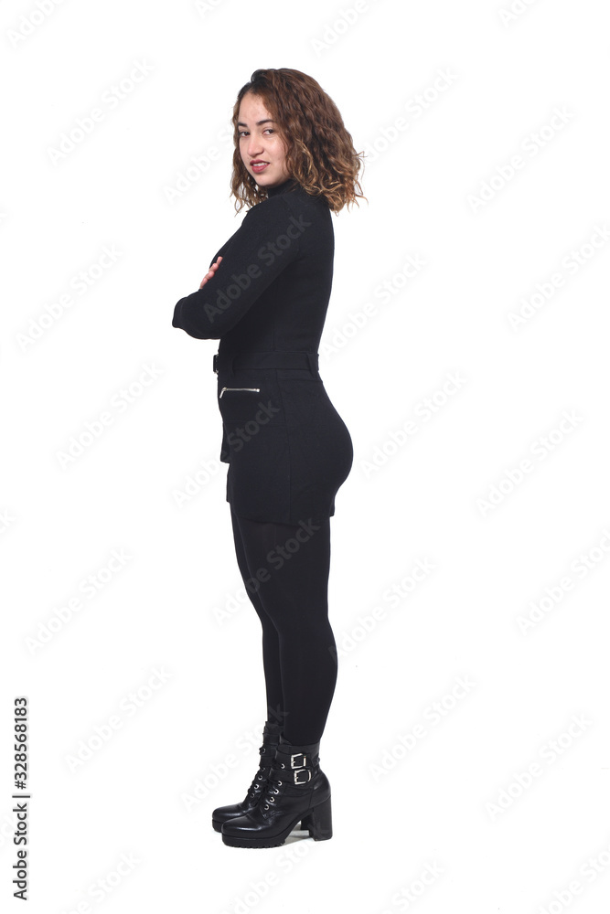profile portrait of a woman with arms crossed and looking at camara profile portrait of a woman with arms crossed and looking at camara