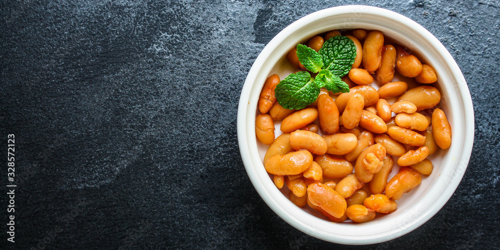beans in tomato sauce, keto or paleo diet menu concept food background. top view. copy spaces beans in tomato sauce, keto or paleo diet menu concept food background. top view. copy spaces