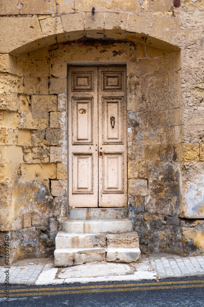 old  door and house in Malta