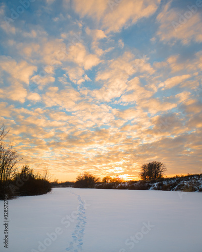 winter sunset on a snowy river