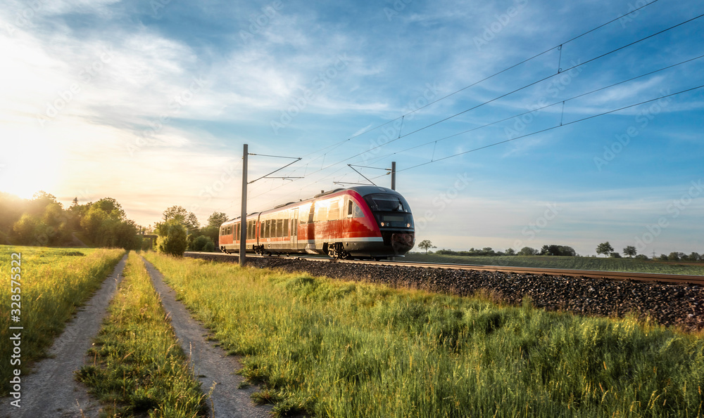 Fototapeta premium Passenger train on sunny day of summer in Germany