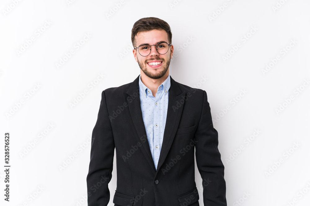 Young caucasian business man posing in a white background isolated Young caucasian business man happy, smiling and cheerful. Young caucasian business man posing in a white background isolated Young caucasian business man happy, smiling and cheerful.
