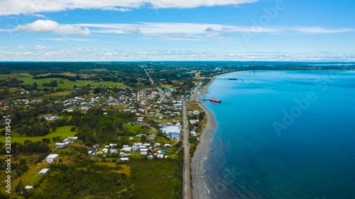 aerial time lapse of Ferry crossing the sea between Pargua and Chacao on the Island of Chiloe photo