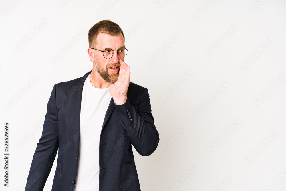 Senior business man isolated on white background is saying a secret hot braking news and looking aside Senior business man isolated on white background is saying a secret hot braking news and looking aside