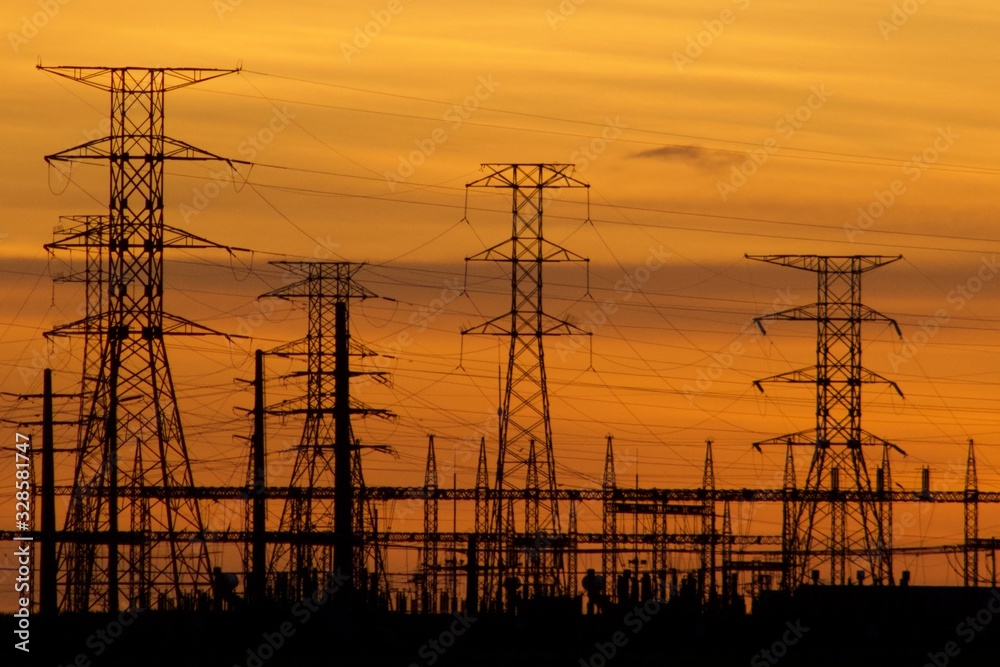 Energy sub station sillouted against a sunset in South Africa