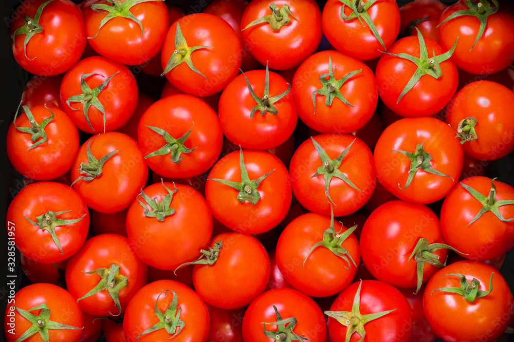 Top view of delicious looking red tomatoes Top view of delicious looking red tomatoes