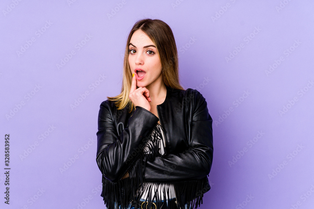Young caucasian woman isolated on purple background having some great idea, concept of creativity. Young caucasian woman isolated on purple background having some great idea, concept of creativity.
