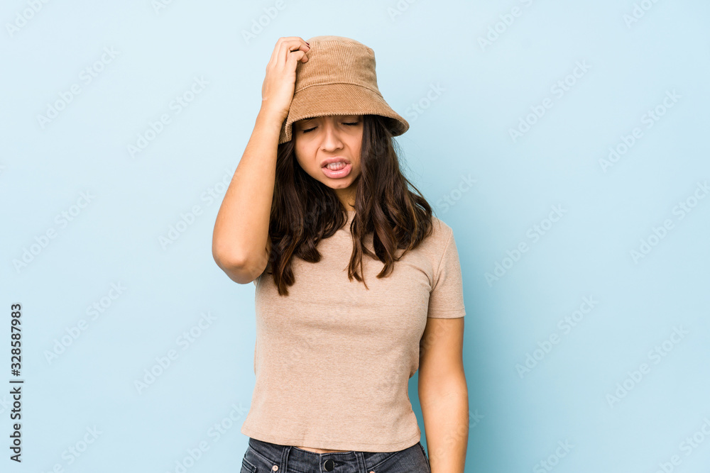 Young mixed race hispanic woman isolated tired and very sleepy keeping hand on head. Young mixed race hispanic woman isolated tired and very sleepy keeping hand on head.