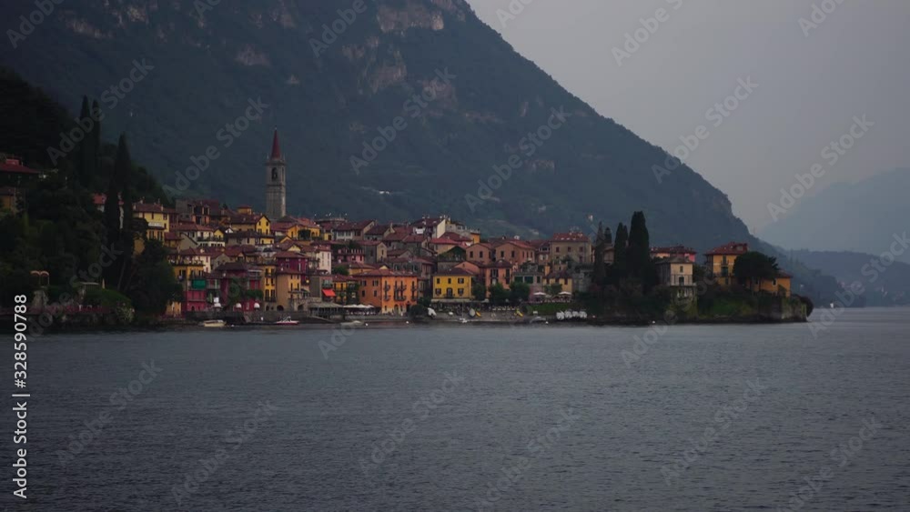Varenna, Lake Como, Italy. Drone low angle shot. Tourism landmark & romantic honeymoon travel destination in Italy. 