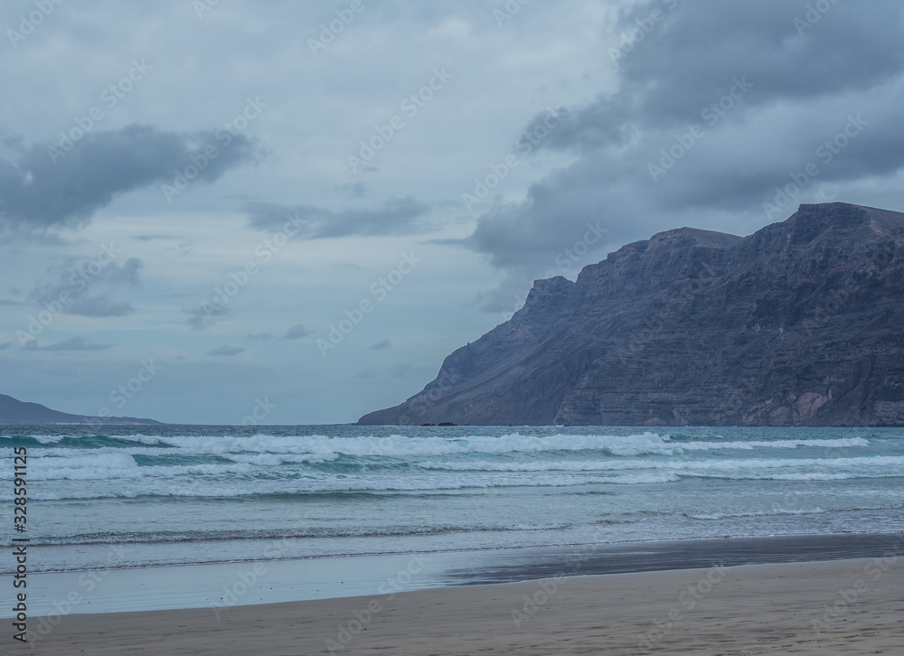 Beach Caleta de Famara on island Lanzarote. Beach Caleta de Famara on island Lanzarote.