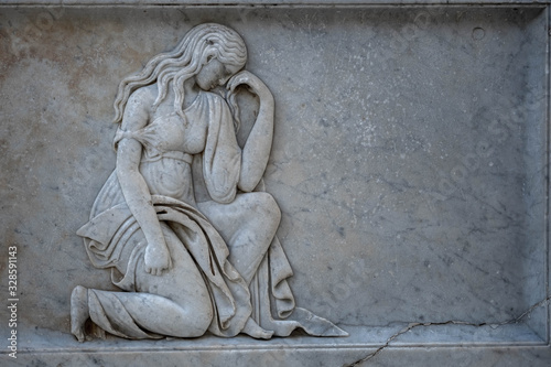 Female Embossed Statue. Sculpture Wallpaper 3D Embossed of a woman in Preveza Epirus Greece, Metropolitan Temple. © Antonios