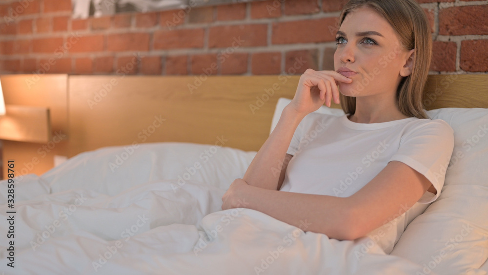 Thoughtful Young Female Thinking about Something in Bed Thoughtful Young Female Thinking about Something in Bed