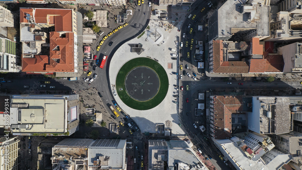 Aerial photo of recently renovated fountain of famous round square of Omonia in the heart of Athens centre, Attica, Greece