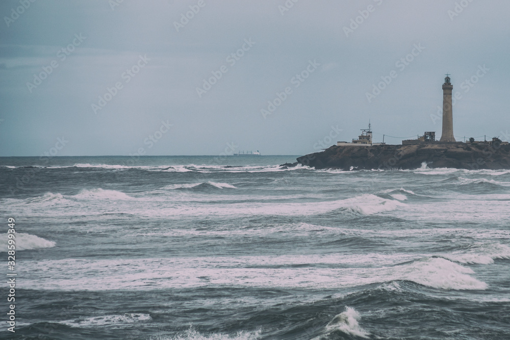 Image of sea and lighthouse in Morocco.