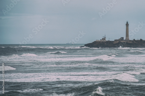 Image of sea and lighthouse in Morocco.