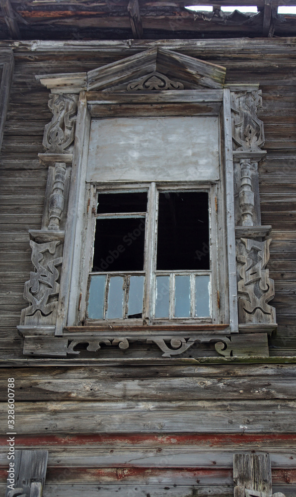 Wooden window in abandoned house in Vologda, Russia