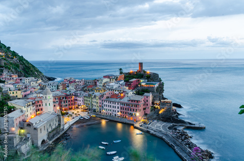 Majestic view of village at night in Cinque Terre, Italy