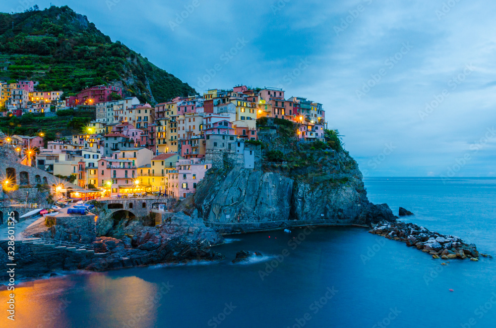Amazing view of vilalge as sun sets in Cinque Terre before sunset in Italy