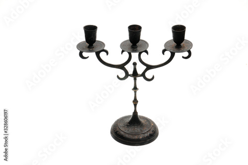 Vintage candlestick on a white background