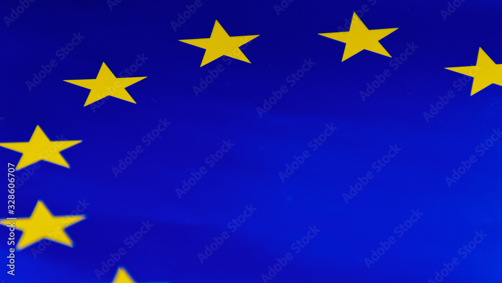 A close-up shot of the European Union paper flag yellow stars A close-up shot of the European Union paper flag yellow stars