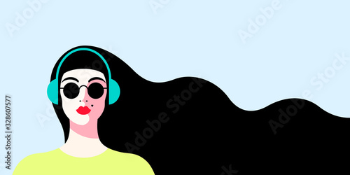 Girl in sunglasses with headphones
