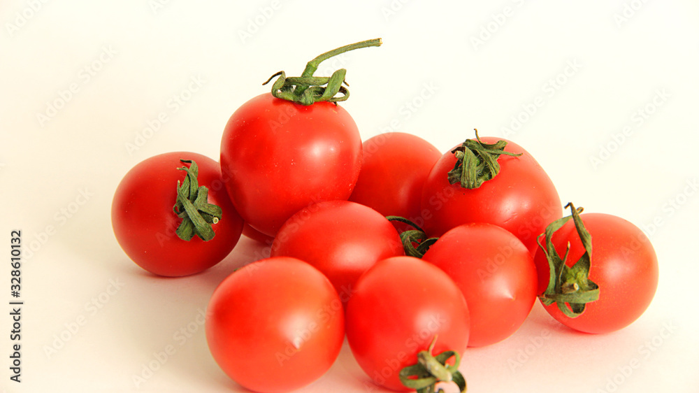 fresh cherry tomatoes on white background