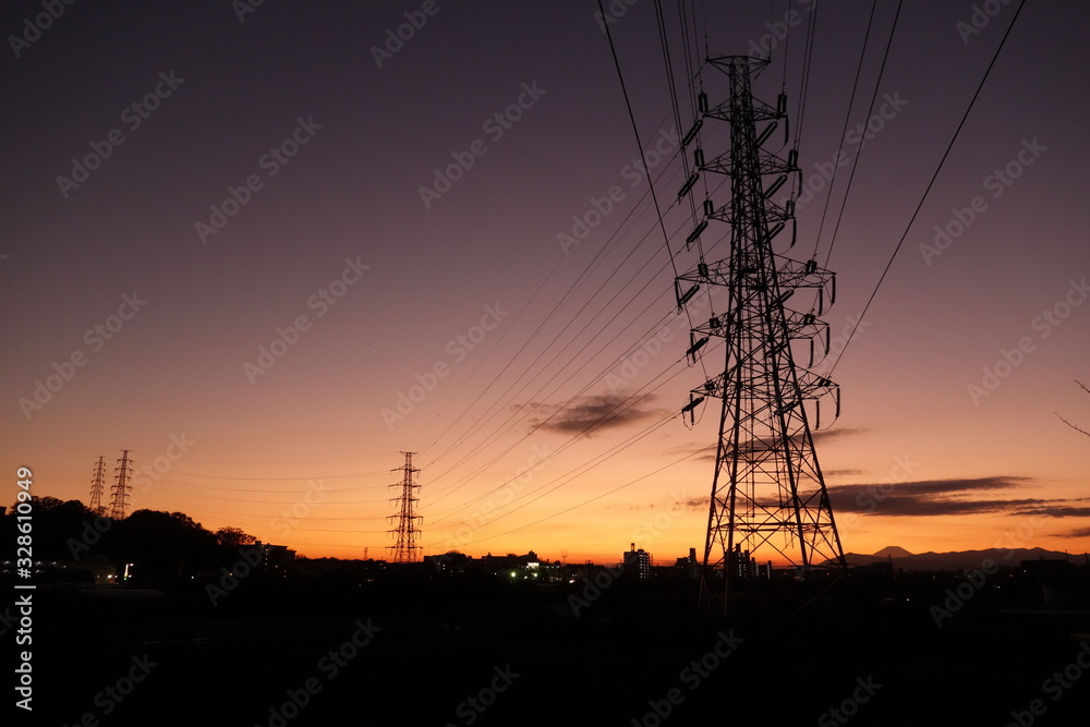 Electric wire standing at sunset