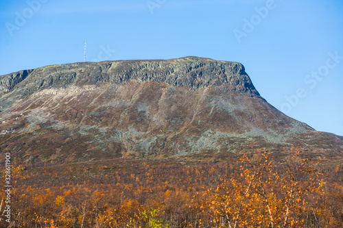 View of Kilpisjarvi village, with Saana mountain, Lake Kilpisjärvi, Enontekiö municipality, Lapland, Finland, the very northwesternmost point of Finland, autumn fall view photo