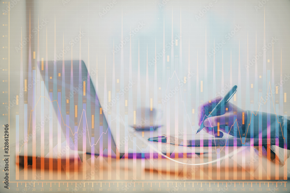 Double exposure of forex chart with man working on computer on background. Concept of market analysis. Double exposure of forex chart with man working on computer on background. Concept of market analysis.