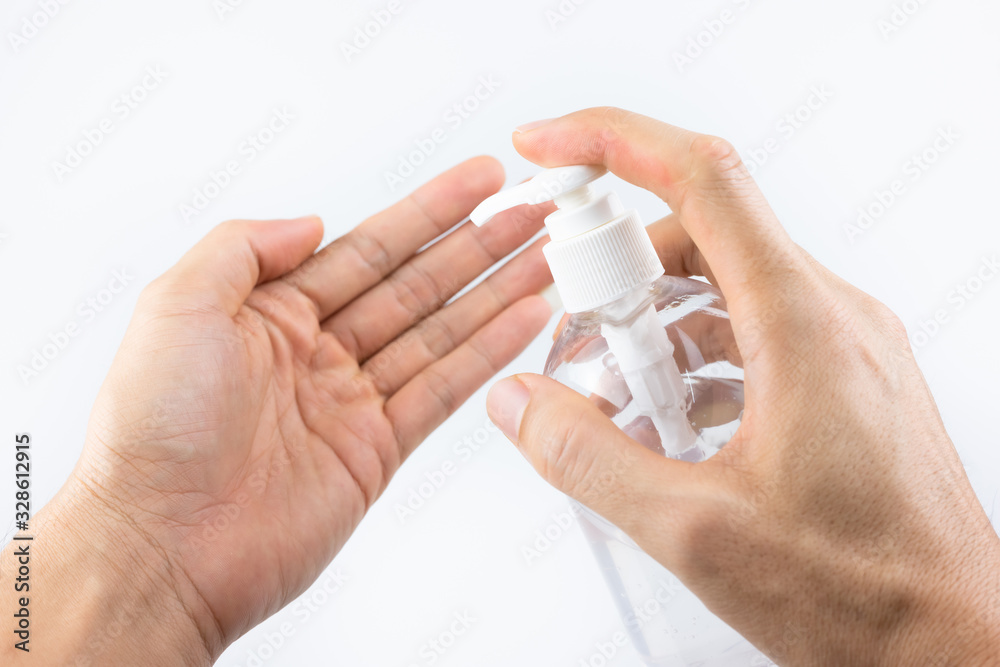 Man hands using wash hand sanitizer gel pump dispenser for protection coronavirus and bacterias, health care concept Man hands using wash hand sanitizer gel pump dispenser for protection coronavirus and bacterias, health care concept