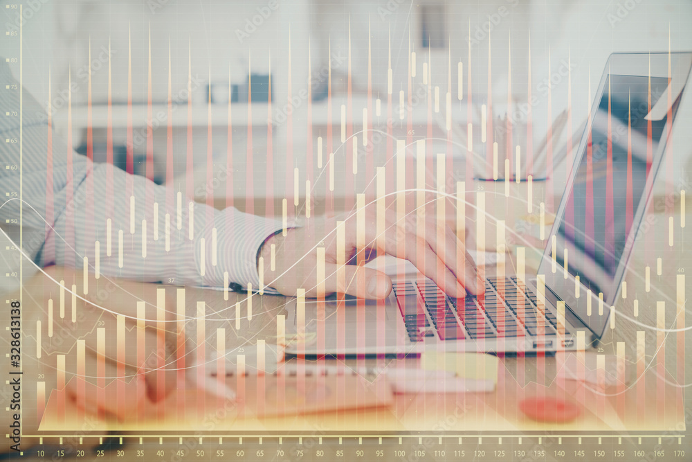 Multi exposure of stock market graph with man working on laptop on background. Concept of financial analysis. Multi exposure of stock market graph with man working on laptop on background. Concept of financial analysis.