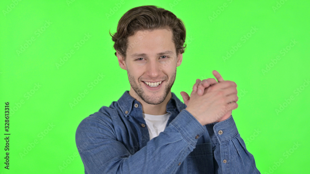 Excited Young Man Clapping and Cheering on Green Chroma Key Excited Young Man Clapping and Cheering on Green Chroma Key