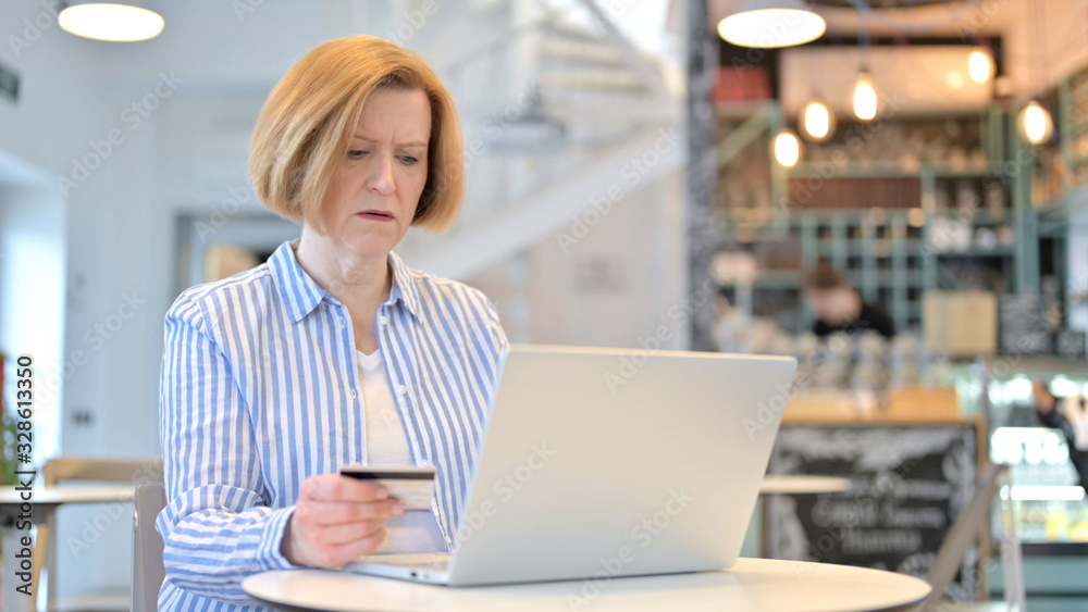 Unsuccessful Online Payment on Laptop by Creative Old Woman Unsuccessful Online Payment on Laptop by Creative Old Woman