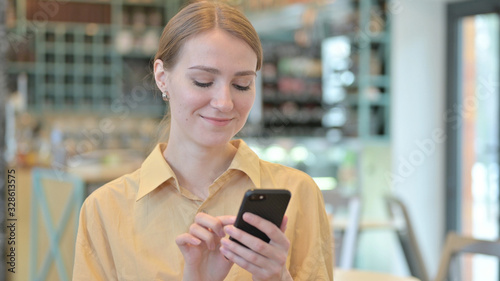 Portrait of Young Woman using Smartphone Free Download Portrait of Young Woman using Smartphone - GFXLoad