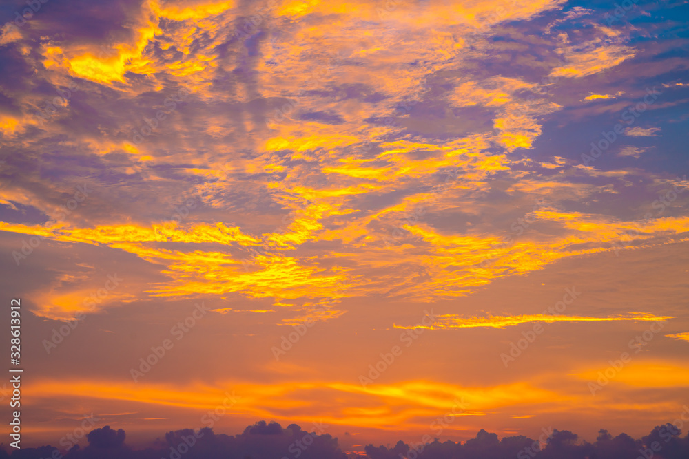 Colorful sunset sky with cloud above sea shore