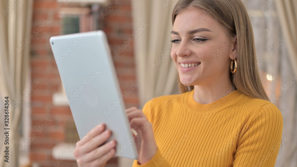 Portrait of Cheerful Female Designer using Tablet Portrait of Cheerful Female Designer using Tablet