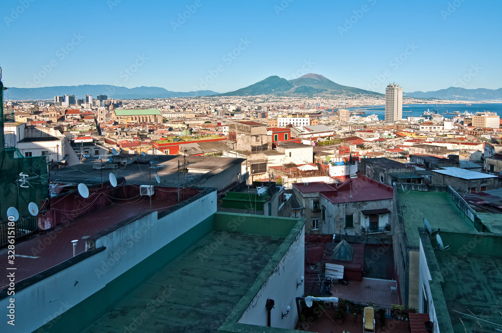 Naples and mount Vesuvius in the background at sunset in a summer day, Italy, Campania