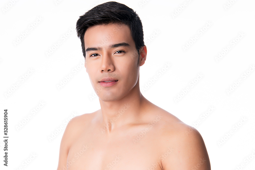 Portrait of Handsome young asian man on white background. Concept of men's health and beauty, self-care, body and skin care.