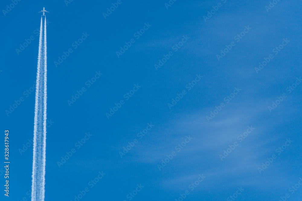 trail of plane flying in blue sky trail of plane flying in blue sky