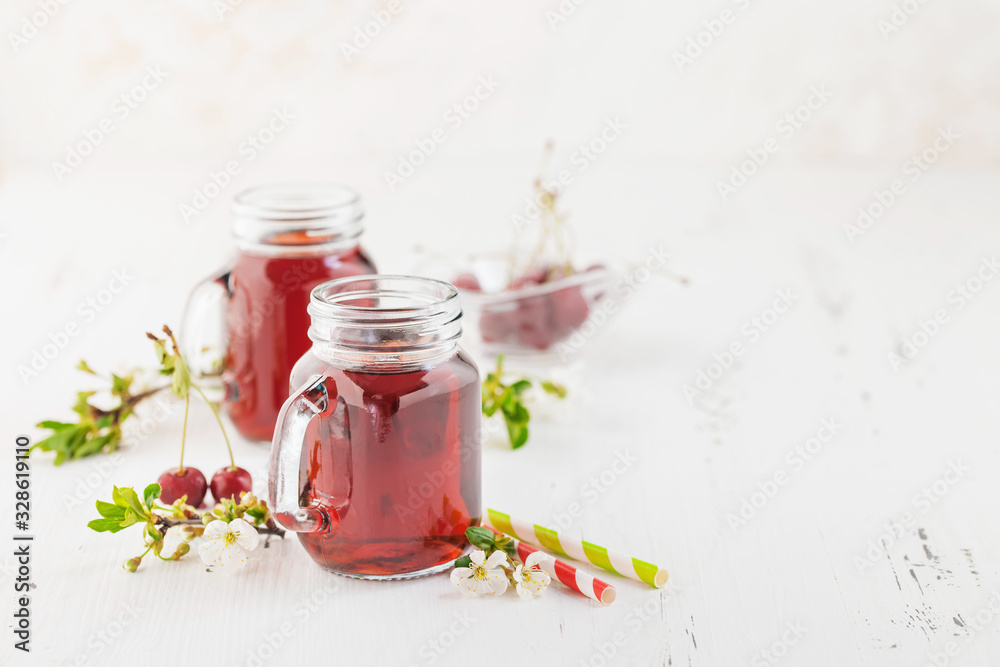 Fresh Cherry juice in a bottle Fresh Cherry juice in a bottle