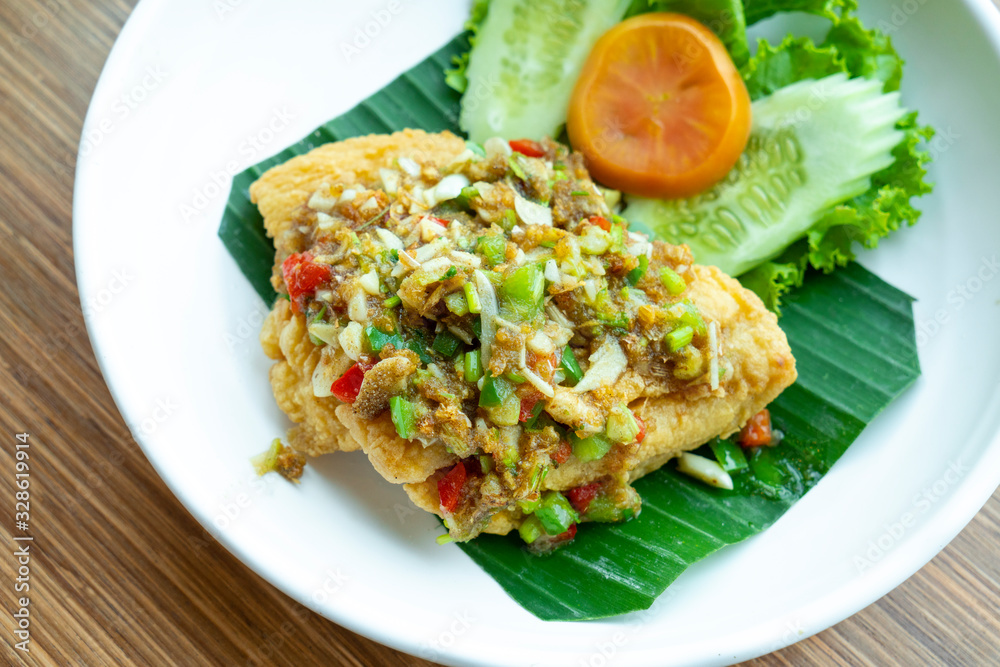 fish topping with garlic and pepper sauce fish topping with garlic and pepper sauce