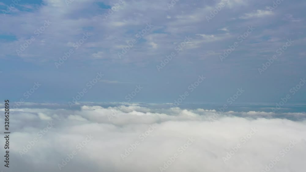 Skyline View above the Clouds from drone Skyline View above the Clouds from drone