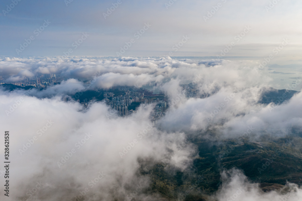Aerial view of city pass through cloud from Mt. Dai Mo Shan 